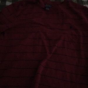 A maroon and navy blue striped polo shirt